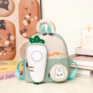 Toddler cartoon backpack in mint green with 3D carrot pocket and bunny charm