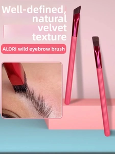 Angled brow brush detail showing precise strokes for a natural feathered eyebrow look