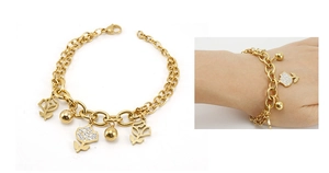 Detail of gold rose pendant bracelet featuring pave set crystals and layered double chains
