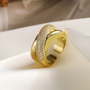 Chic 18K gold-plated cross open ring with sparkling pavé zircons on silk background