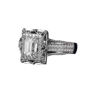 Luxury silver ring featuring emerald-cut zircon with micro-pave halo and vintage side carving