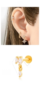 Macro detail of zircon heart earring with 1.2mm titanium post and marquise stones