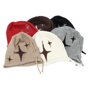 Detailed flat lay showing star pattern knit beanies with drawstrings in six colors