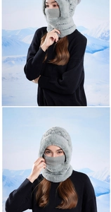 Detail of grey winter integrated hood and neck warmer with plush faux fur material