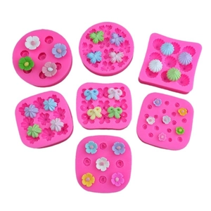 Pink silicone molds set for floral and bow cake decorations and chocolate crafting