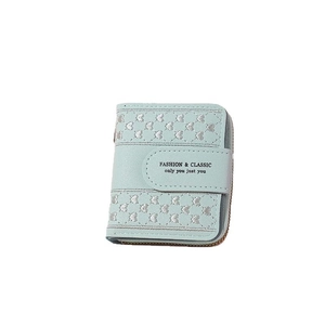 Short mint green quilted wallet with heart pattern and gold zipper for women