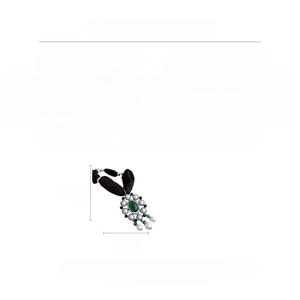 Detailed view of oval emerald crystal pendant surrounded by white pearls on a black strap
