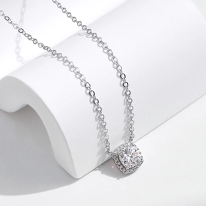 Classic 1 carat square cut moissanite pendant necklace in 925 sterling silver on display