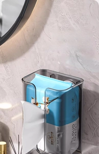 Detail of wall-mounted transparent PET tissue box with suction cup on bathroom wall