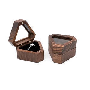 Deep brown hexagonal wooden ring box with magnetic closure and black velvet lining