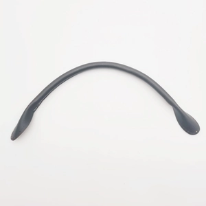 Detailed view of black thickened leather handbag handle with core stitching and texture