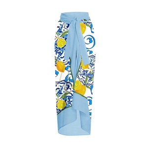 Detail of beach wrap skirt with Mediterranean tile pattern and lemon print