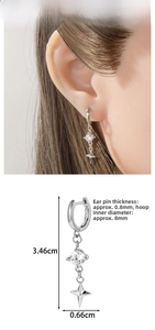 Détails de la boucle d'oreille étoile argentée avec mesures et port du modèle
