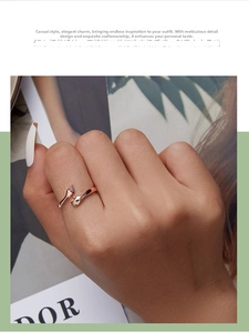 Detail of rose gold 925 sterling silver hug ring with a high-polished mirror finish