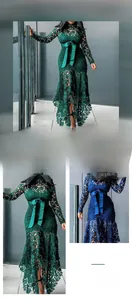 Detailed lace embroidery and stand collar design with a waist bow tie on a long dress