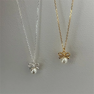 Elegant 925 sterling silver bow and pearl necklace set in gold and silver finish