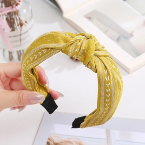 Bandeau en tissu jaune avec imprimé floral blanc et détail de nœud élégant pour femme