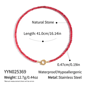 Detailed view of pink natural stone beaded necklace with a golden stainless steel clasp