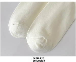 Detailed macro view of the exquisite white cotton sock toe with seamless stitching