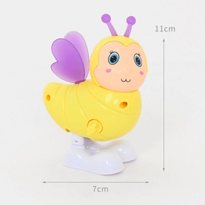 Détail du jouet mécanique abeille avec dimensions de 11 cm de hauteur et 7 cm de large