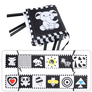 Detail view of foldable black and white high contrast cloth book for newborn sensory play