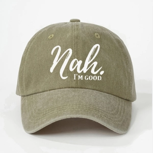 Washed military green baseball cap with white 'Nah. I'M GOOD.' printed slogan