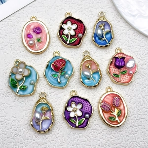 Assorted Monet oil painting style flower pendants with faux pearls for DIY jewelry making