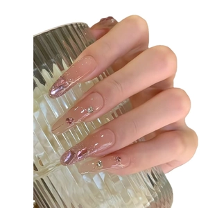 Pink gradient long coffin press-on nails with sparkling rhinestones and heart-shaped gems