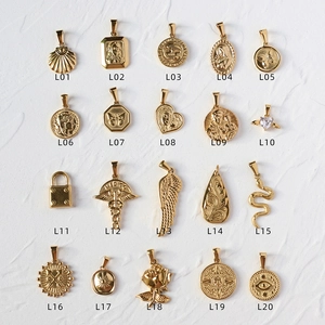Collection of 20 assorted 18K gold plated titanium steel pendants in various designs