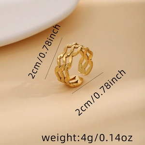 Detail shot showing 2cm diameter and 4g weight of hollow woven gold stainless steel ring