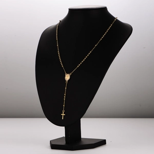 Elegant gold-tone stainless steel Y-shaped necklace with oval relief and cross pendant