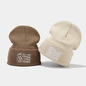Brown and beige knitted beanies with white letter embroidery for autumn and winter outdoor wear