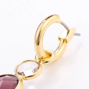 Faceted purple crystal gold plated hoop earrings with geometric tiered design