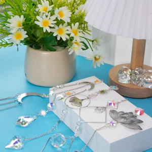 Silver lotus moon suncatcher with colorful crystal prisms for garden window decor