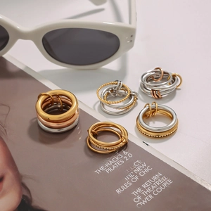 Stackable multi-layer stainless steel ring sets in gold, silver, and rose gold colors