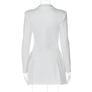 Back view of a white deep V-neck blazer dress featuring elegant ruffled hem details