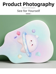 Detail of cute tooth-shaped hand mirror with cartoon character in gradient macabre colors