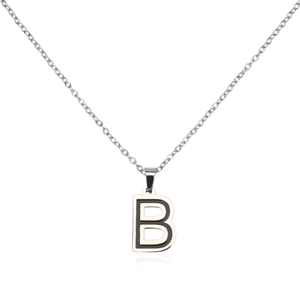 Detail of letter B pendant with black enamel inlay and silver stainless steel chain