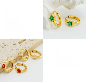Detail of gold star hoop earrings featuring colorful inlaid zircon and polished finish