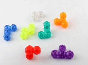 Macro view of translucent colorful magnetic building blocks in various spherical shapes