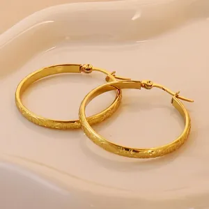 18K gold plated stainless steel hoop earrings with dragon scale texture and snap closure