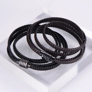 Multilayer braided leather bracelet with black magnetic clasp in brown and black colors