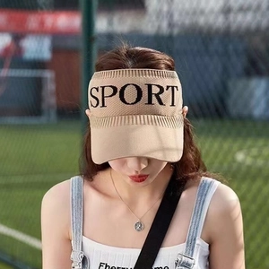 Detail view of khaki knit sun visor featuring black embroidered Sport lettering text