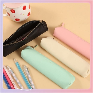 Minimalist PU leather pencil cases in pastel colors with metal zippers and modern embossing