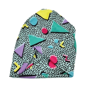 Retro geometric print slouchy beanie with colorful Memphis style patterns for winter warmth