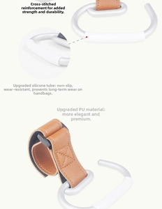 Detail of durable brown leather stroller hook with reinforced stitching and non-slip tube