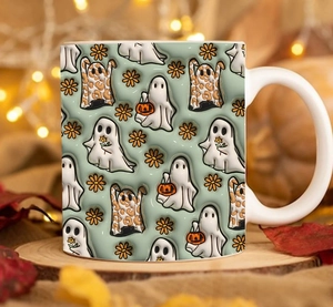 Detail of light green ceramic Halloween mug with leopard print ghost and pumpkin pattern