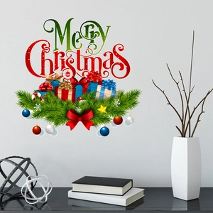 Detailed view of Merry Christmas wall stickers with red and green bells on white wall