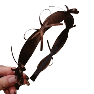 Elegant dark brown satin headband featuring multiple delicate bows in a French style