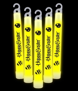 Detail view of five glowing yellow 6-inch glow sticks with Happy Easter chicken prints